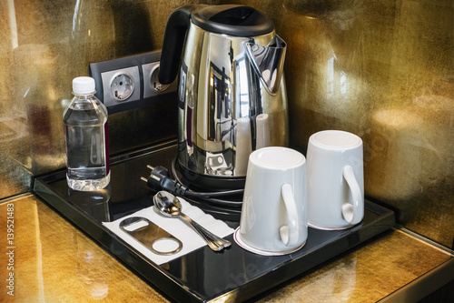 tea and coffee for a hotel room at the self-service table.