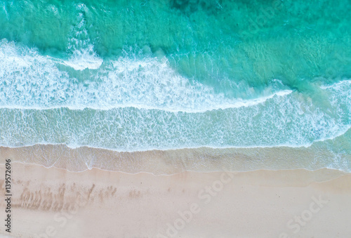 Aerial view. Top view.amazing nature background.The color of the water and beautifully bright.Azure beach with rocky mountains and clear water of Thailand ocean at sunny day.