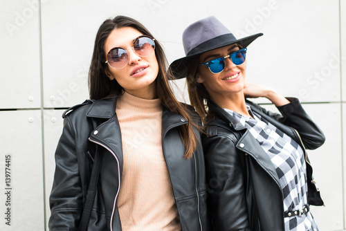 Two pretty young women with sunglasses
