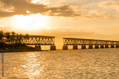 Remains of Bahia Honda railroad bridge in Florida Keys at sunset 