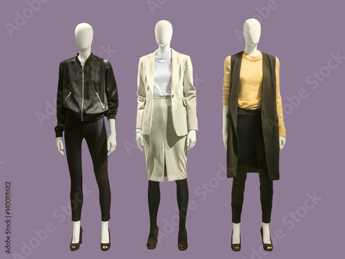 Three full-length female mannequins