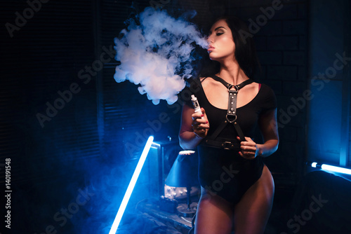 vapor concept,sexy woman in lingerie vaping Electronic hookah