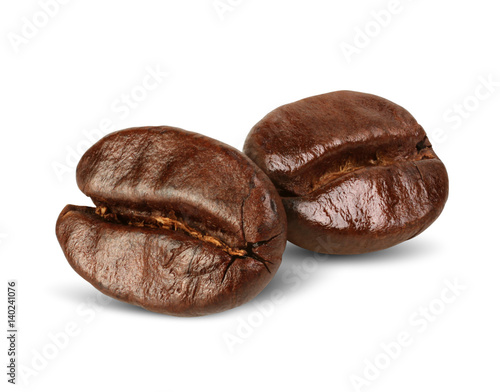 Macro two coffee beans isolated on white, path