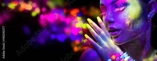 Beauty woman in neon light, portrait of beautiful model with fluorescent makeup