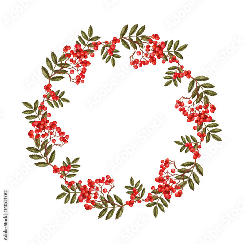 Wreath made of branches of rowan with leaves and berries on a white background.