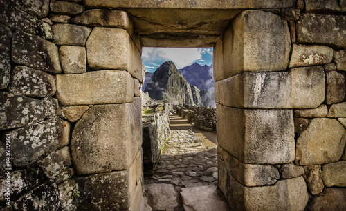 Doorway at Machu Picchu frames a view of Huayna Picchu, Machu Picchu, Unesco World Heritage site, Sacred Valley, Peru 