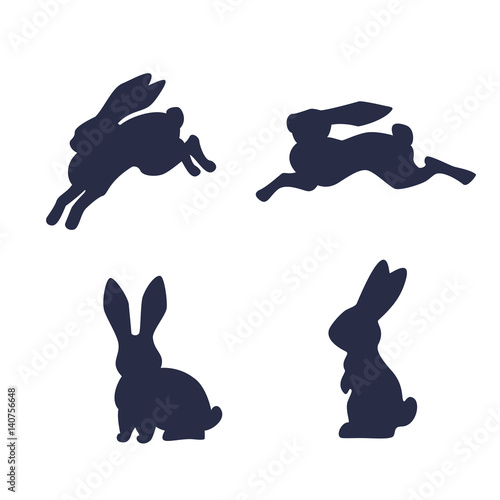 Running hare vector silhouette isolated on white background. Black and white rabbit silhouette set. Happy Easter rabbits outlines