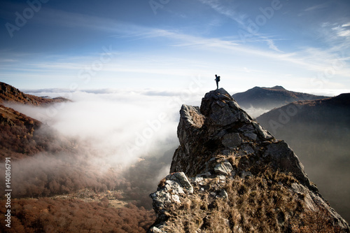 Man standing on the top of the Massif du Sancy