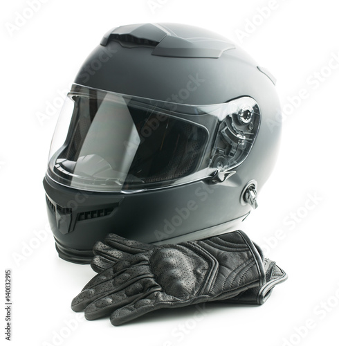 Motorcycle helmet and leather gloves.
