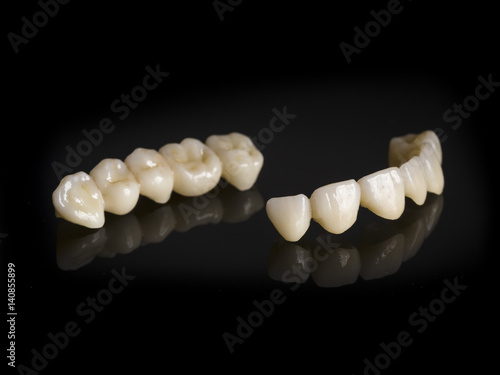 Monolithic zirconia restorations full arch implant supported with the ceramic load in vestibular, back background