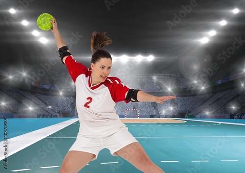 Player playing handball in stadium