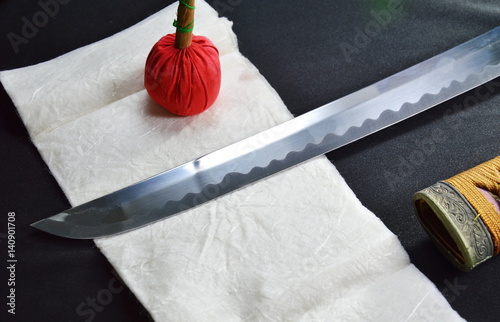Katana Japanese sword blade and scabbard with red compress for cleaning