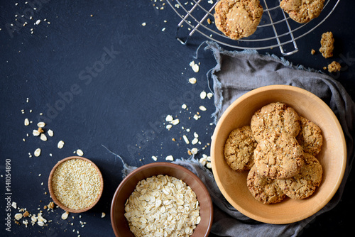 Dark baking oat cookies background