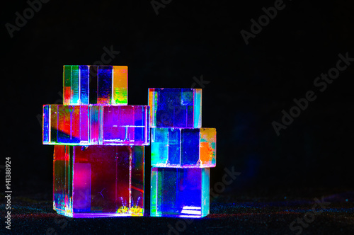 Abstract Cubes concept relecting bright prism colors in unique background