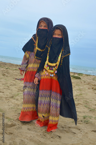 Young girls in traditional dress of nomad family of the Rashaida (Rashaayda) Arab tribe living in Eritrea