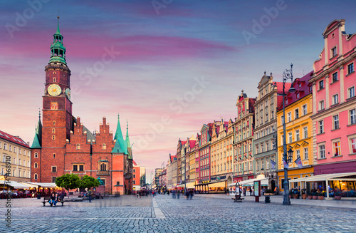 Colorful evening scene on Wroclaw Market Square with Town Hall.