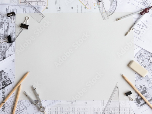 Architectural plans, pencil and ruler on the table. Place for your text