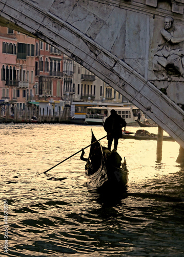 Venice Italy Gondolier under the Rialto bridge