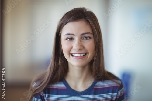 Portrait of smiling schoolgirl