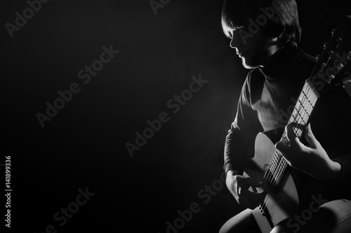 Acoustic guitar player guitarist playing classical guitar