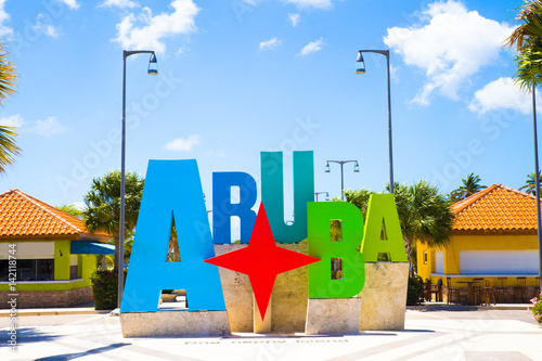 Aruba tourism colorful welcome sign
