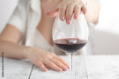 woman refused a glass of wine