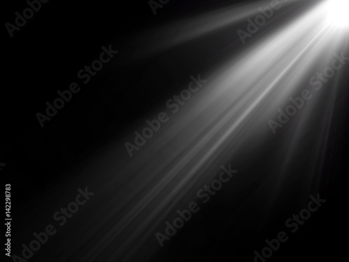 abstract beautiful rays of light on black background.