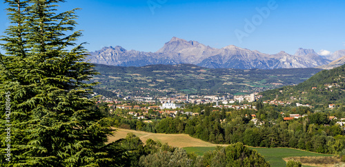 The Hautes Alpes city of Gap in Summer. Panoramic. Southern French Alps, France