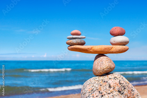 Concept of harmony and balance. Balance stones against the sea.