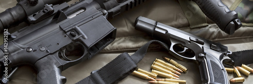 Assault rifle with handgun and ammunition. Military weapon