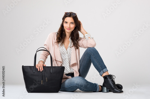 Fashion woman sitting