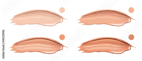 Cosmetic liquid foundation cream set in different colour smudge smear strokes. Make up smears isolated on white background.