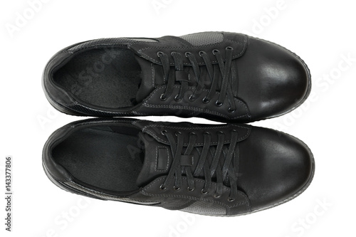 Top view of a pair of men's sports shoes isolated on white background.Top view of modern sport shoes isolated on white background.
