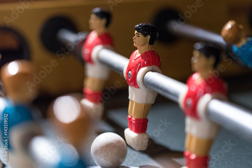 Table football kicker with miniature players