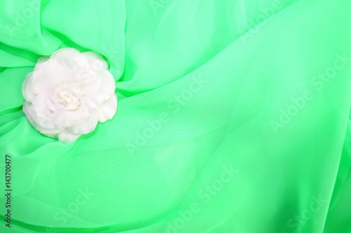 Green wedding balls celebrate abstract background with textile rose decoration