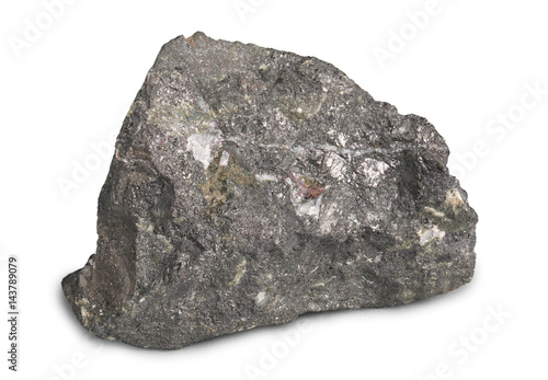 Mineral stone magnetite (lodestone) isolated on white background. Magnetite is the most magnetic of all minerals on Earth . 
