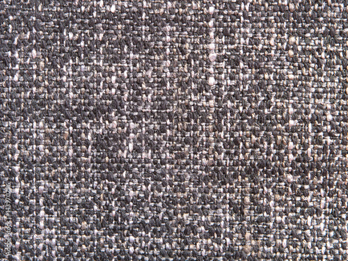 Texture of old textile vintage background with a pattern of gray color closeup