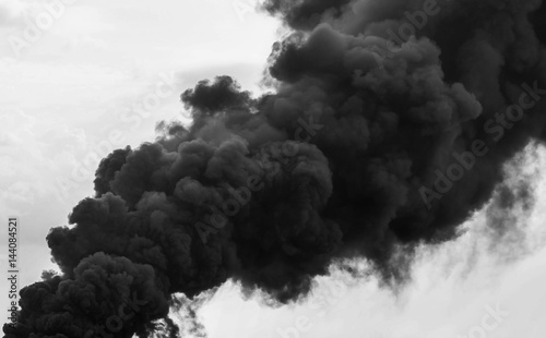 Huge smoke clouds on sky background