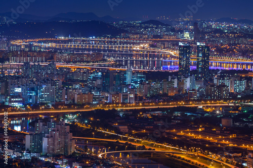 Seoul city and bridge and Han river at night, South Korea.