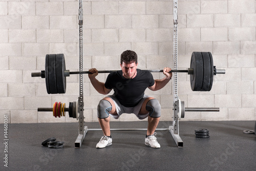 Man doing a crossfit back squat exercise