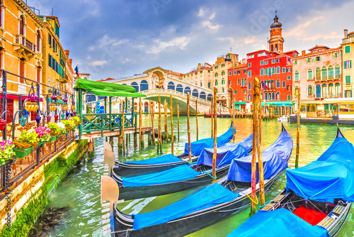 Gondola on Grand Canal with Rialto Bridge, Venice, Italy.