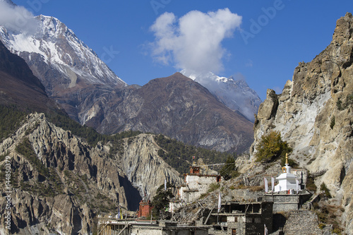 Traditional stone build village of Manang. Mountains in the background. Annapurna area, Himalaya, Nepal
