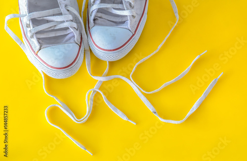 me, message on shoelace with sneakers.