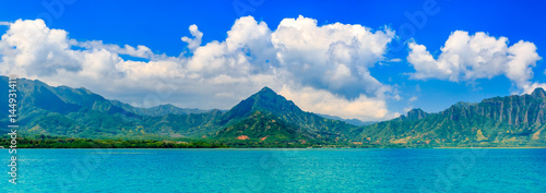 Panoramia of tropical lagoon and lush mountains and the ocean in Oahu, Hawaii