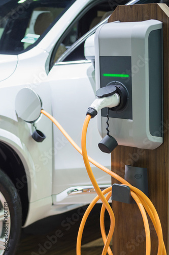 Charging an electric car with the power cable supply