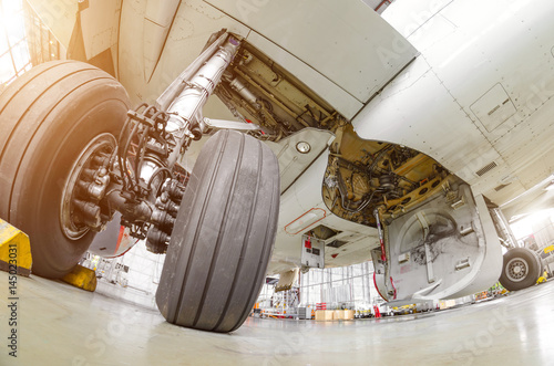 Landing gear airplane in hangar chassis rubber close-up