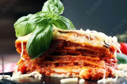 Serving of spicy traditional Italian beef lasagne in a restauran
