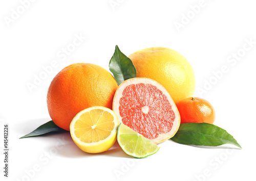 Citrus fruits on white background