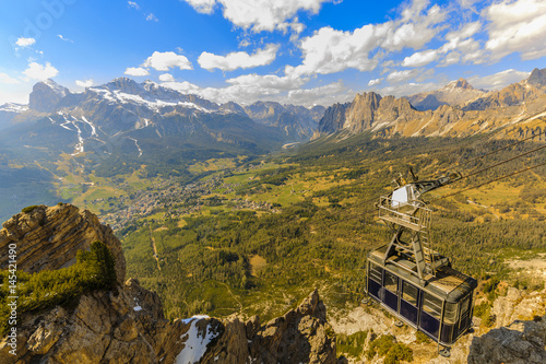 Aerial spring view from Faloria on Cortina Valley and cable car in Dolomites, Italy - Cortina D'Ampezzo at Tondi al Faloria