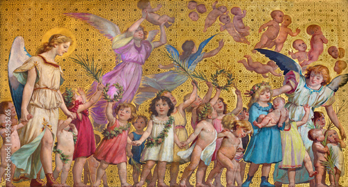 TURIN, ITALY - MARCH 15, 2017: The symbolic fresco of holy innocents children with the angels in church Chiesa di San Dalmazzo by Enrico Reffo (1831-1917).